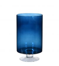 hohes Windlicht auf Fuß aus blau getöntem Glas