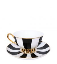 schwarze Teetasse und Teller mit Streifen